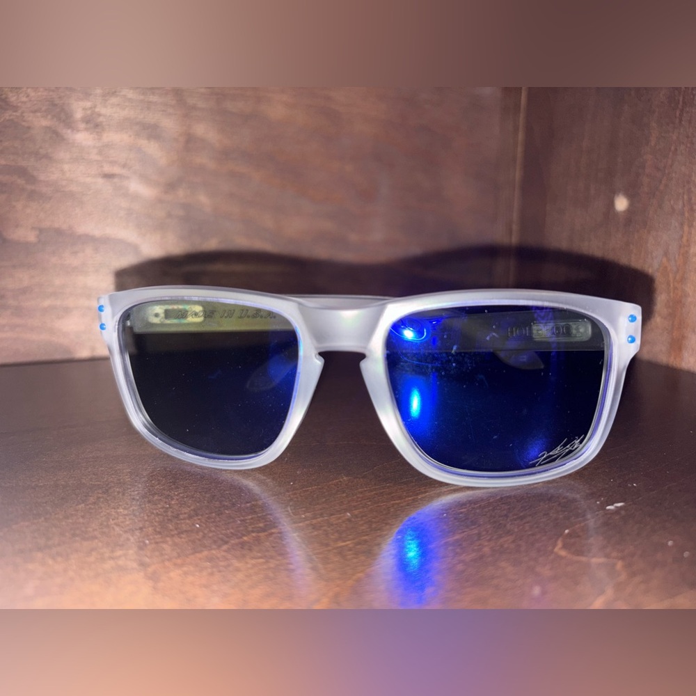 Oakley Frosted Frame Sunglasses with Blue Lenses